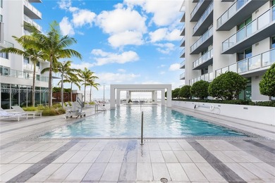 Experience elevated Miami living in this FULLY FURNISHED