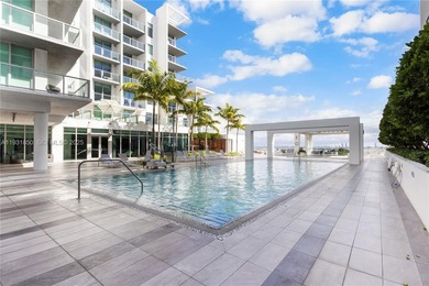 Experience elevated Miami living in this FULLY FURNISHED