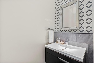 Welcome to Art House Unit 3C, a top-floor, luxury condo designed