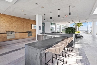 Experience elevated Miami living in this FULLY FURNISHED