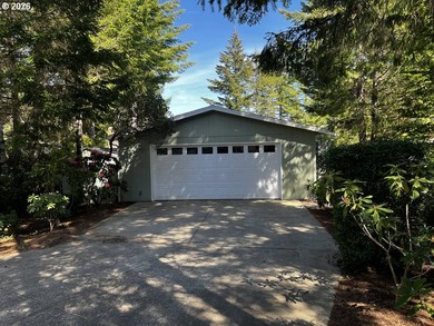 Nestled in the desirable Coast Village gated community, this - photo 1