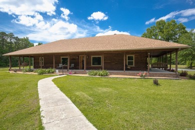 Escape to your own private retreat with this stunning custom log - photo 1