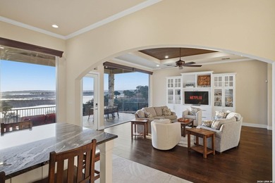 Experience true lakefront living in this stunning custom home - photo 11