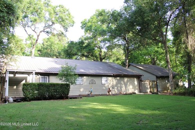This home features an open floor plan, lots of shade from the - photo 13