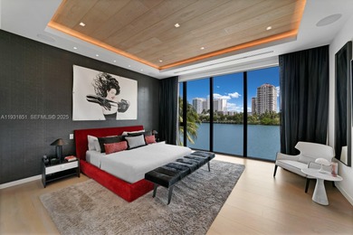 Private island living at its finest. This tropical modern estate