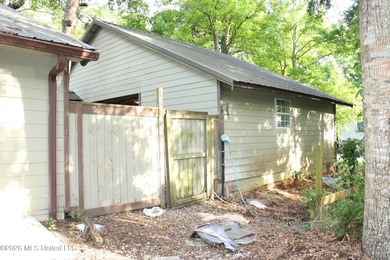 This home features an open floor plan, lots of shade from the - photo 14