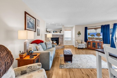 Enjoy coastal living in this beautifully updated second-floor - photo 3