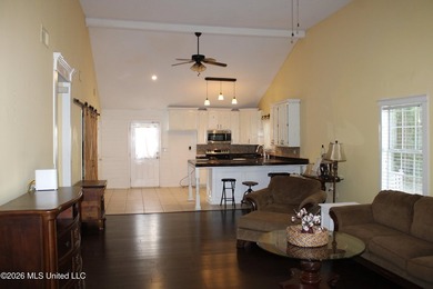 This home features an open floor plan, lots of shade from the - photo 25