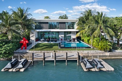 Private island living at its finest. This tropical modern estate
