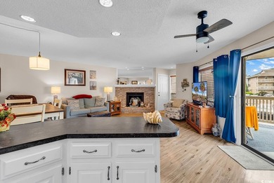 Enjoy coastal living in this beautifully updated second-floor - photo 7