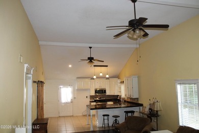 This home features an open floor plan, lots of shade from the - photo 27