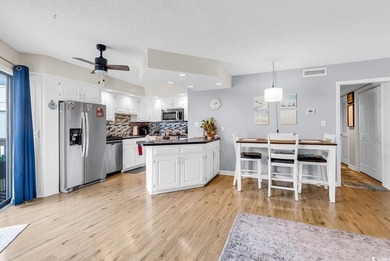 Enjoy coastal living in this beautifully updated second-floor - photo 10