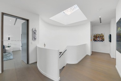 Private island living at its finest. This tropical modern estate