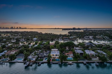 Private island living at its finest. This tropical modern estate