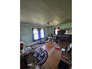 This unique cottage-style property in Falmouth, Maine, is a rare - photo 16