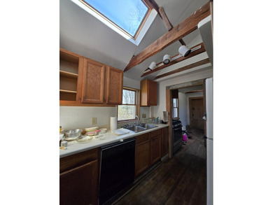 This unique cottage-style property in Falmouth, Maine, is a rare - photo 21