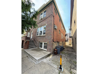 Beautiful and well-maintained legal 3-family detached home in - photo 2
