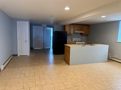 Beautiful and well-maintained legal 3-family detached home in - photo 5