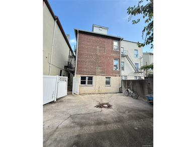 Beautiful and well-maintained legal 3-family detached home in - photo 10