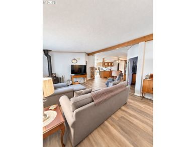 Experience tranquility at Giadanj Lake Estates with this updated - photo 5
