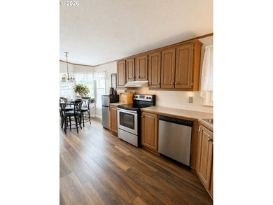 Experience tranquility at Giadanj Lake Estates with this updated - photo 10