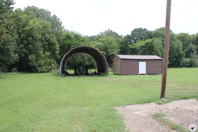 Welcome Home to Serenity! Nestled on 6.16 acres, this