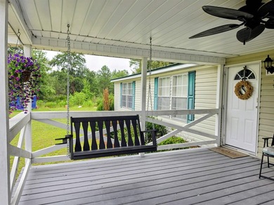 Enjoy the peace and privacy of country living in this - photo 3