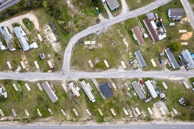 9 acre Mobile Home Park, 23 lots leased at $450 each monthly, 4 - photo 13