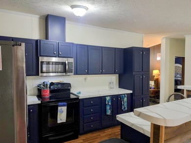 Enjoy the peace and privacy of country living in this - photo 9