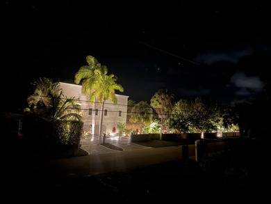 Nestled within this 280 ft of concrete walled and gated property - photo 4