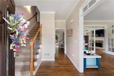 This beautiful two-story home over a full basement offers the - photo 11