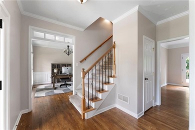 This beautiful two-story home over a full basement offers the - photo 12