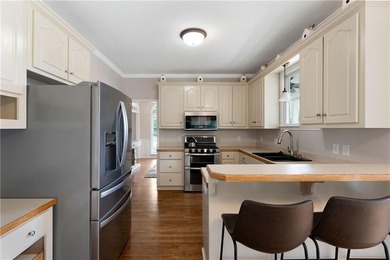 This beautiful two-story home over a full basement offers the - photo 16