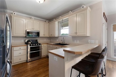 This beautiful two-story home over a full basement offers the - photo 17