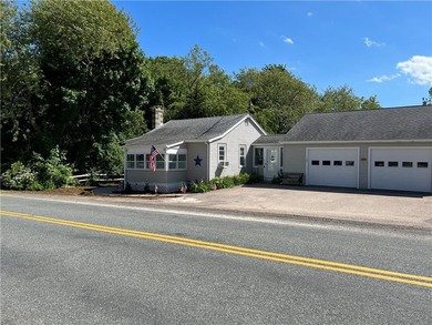 2 cottages on one parcel Main house has a 2 car garage with a