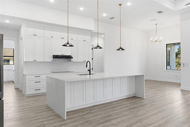 Welcome to this modern, custom-built home perfectly situated on