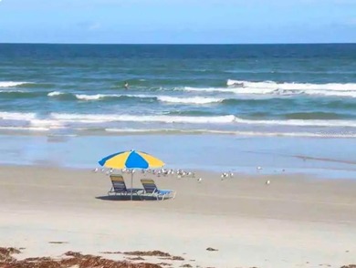 Welcome to your own coastal sanctuary. This beautifully updated - photo 2