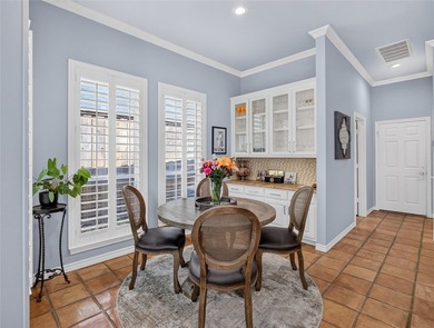Nestled beneath mature shade trees in the prestigious gated - photo 14
