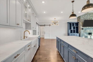 Welcome to 155 Riverview Court, a masterfully crafted 7 - photo 18