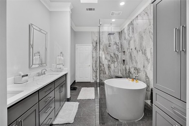 Nestled beneath mature shade trees in the prestigious gated - photo 20