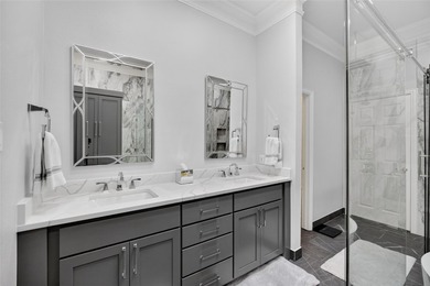 Nestled beneath mature shade trees in the prestigious gated - photo 21