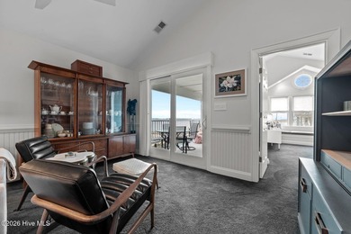 Wake up to sweeping, wide water views in this beautifully - photo 22