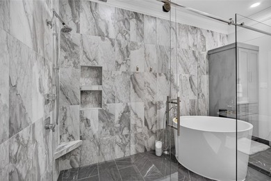 Nestled beneath mature shade trees in the prestigious gated - photo 22