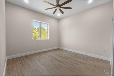 Experience modern Gulf Coast living at 5468 Cimmeron Ct in Gulf - photo 22