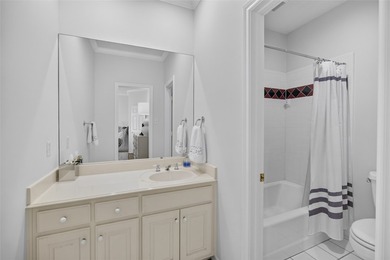 Nestled beneath mature shade trees in the prestigious gated - photo 31