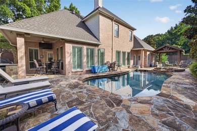 Nestled beneath mature shade trees in the prestigious gated - photo 37