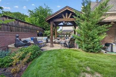 Nestled beneath mature shade trees in the prestigious gated - photo 38