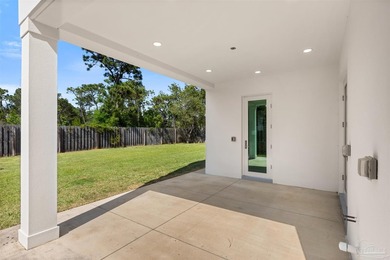 Experience modern Gulf Coast living at 5468 Cimmeron Ct in Gulf - photo 46