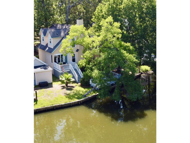 Enjoy waterfront living in this charming lakefront property - photo 3