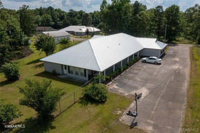 GREAT price on this versatile property...Metal Roof is only 2